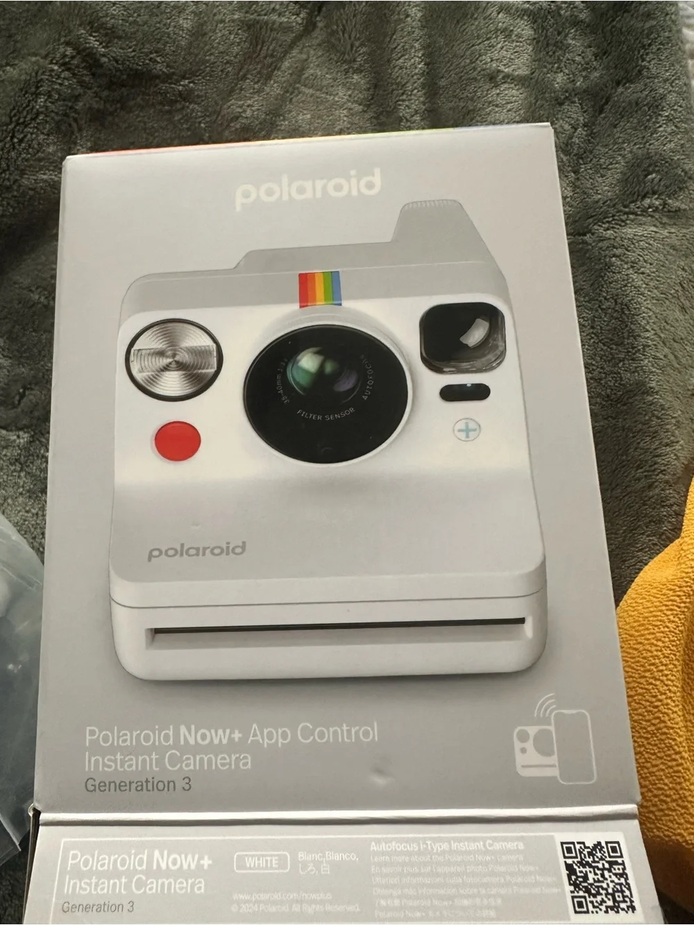 NEW IN BOX. Polaroid White Instant Camera with Rainbow Accent. NEVER USED.